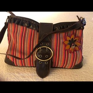 Oilily stripe fabric purse with suede flower appliqué.
